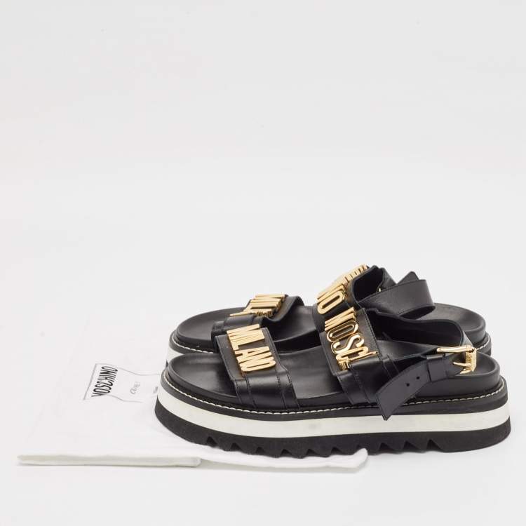 Pre Owned Moschino Black Leather Logo plaque Slingback Sandals Size 43