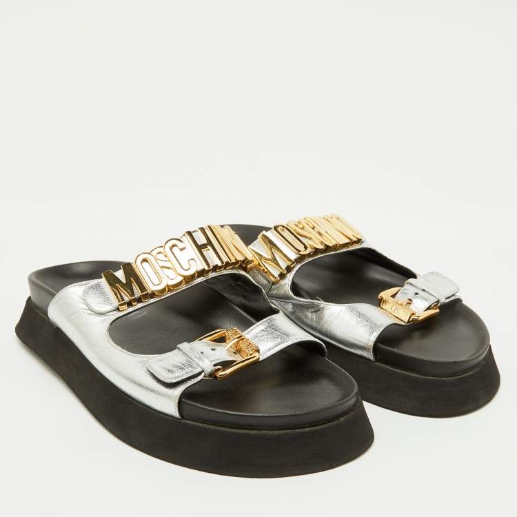 Pre Owned Moschino Silver Leather Logo Buckle Detail Chunky Slide Sandals Size 39