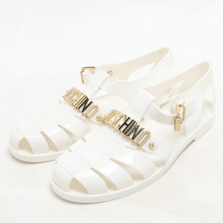 Pre Owned Moschino White Jelly Logo Flats Size 38