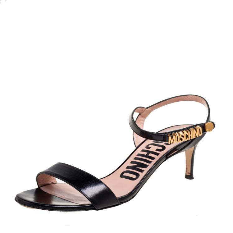 Pre Owned Moschino Black Leather Logo Plaque Ankle-Strap Sandals Size 37