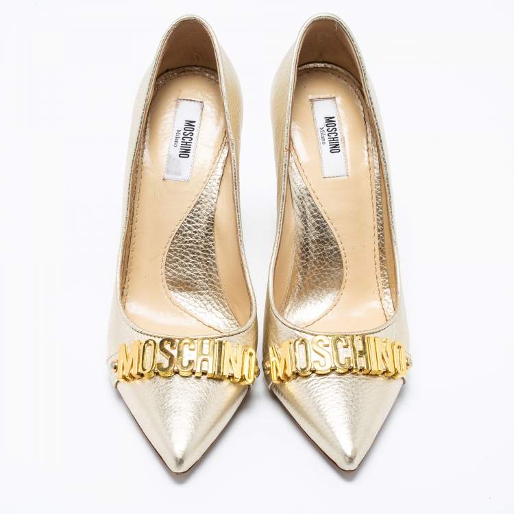 Pre Owned Moschino Metallic Gold Leather Logo Embellished Pointed Toe Pumps Size 36