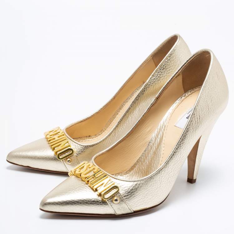 Pre Owned Moschino Metallic Gold Leather Logo Embellished Pointed Toe Pumps Size 36