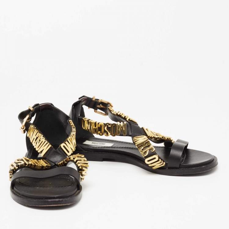 Pre Owned Moschino Black Leather Logo Print Sandals Size 36