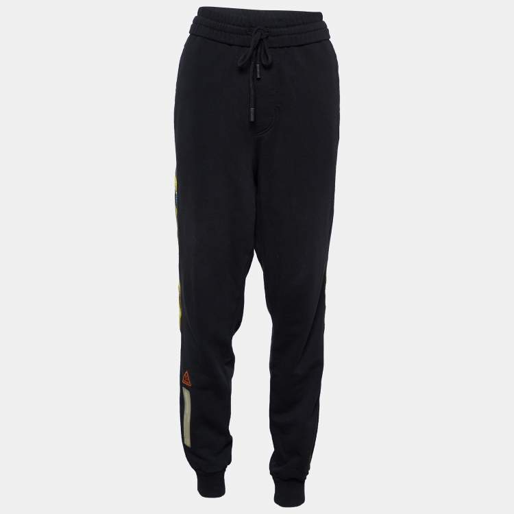 GANNI Embroidered cotton-blend fleece track pants | THE OUTNET