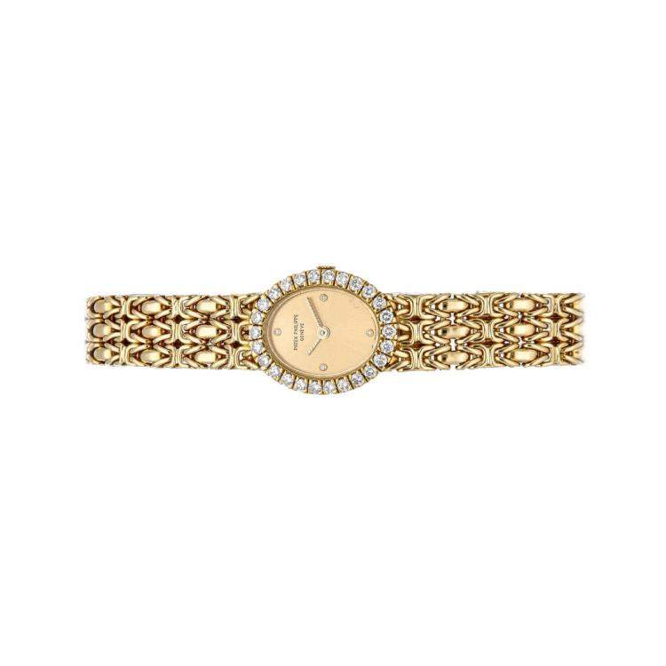 Pre Owned Patek Philippe Champagne Diamonds 18K Yellow Gold Vintage Oval 4752/001 Women's Wristwatch 18 MM