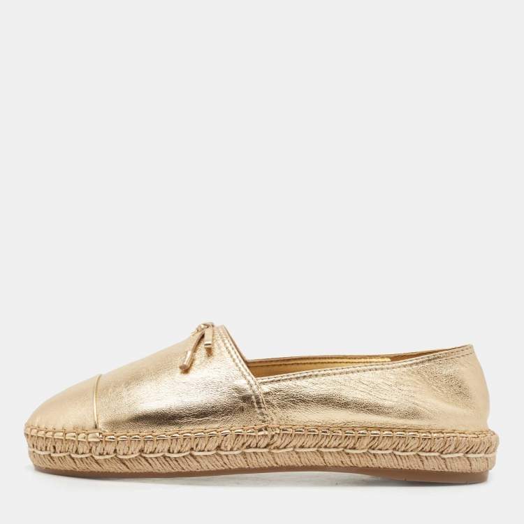 Prada gold fashion flats