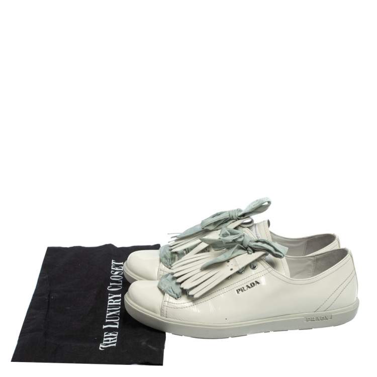 Pre Owned Prada Sport Off White Patent Leather Fringe Detail Low Top Sneakers Size 41