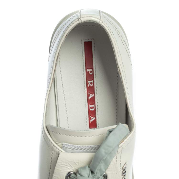 Pre Owned Prada Sport Off White Patent Leather Fringe Detail Low Top Sneakers Size 41