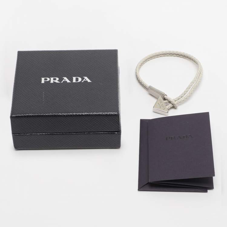 Pre Owned Prada Off-White Braided Leather Triangle Charm Bracelet