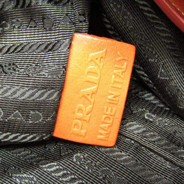 Pre Owned Prada Orange Leather Logo Embossed Duffel Bag