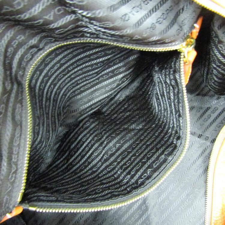 Pre Owned Prada Orange Leather Logo Embossed Duffel Bag