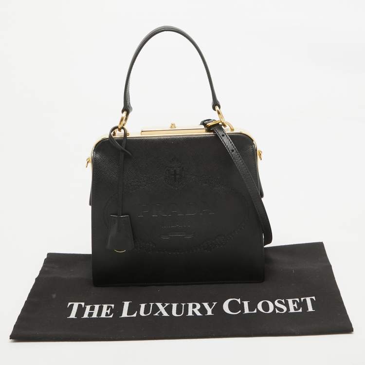 Pre Owned Prada Black Logo Print Saffiano Leather Frame Top Handle Bag