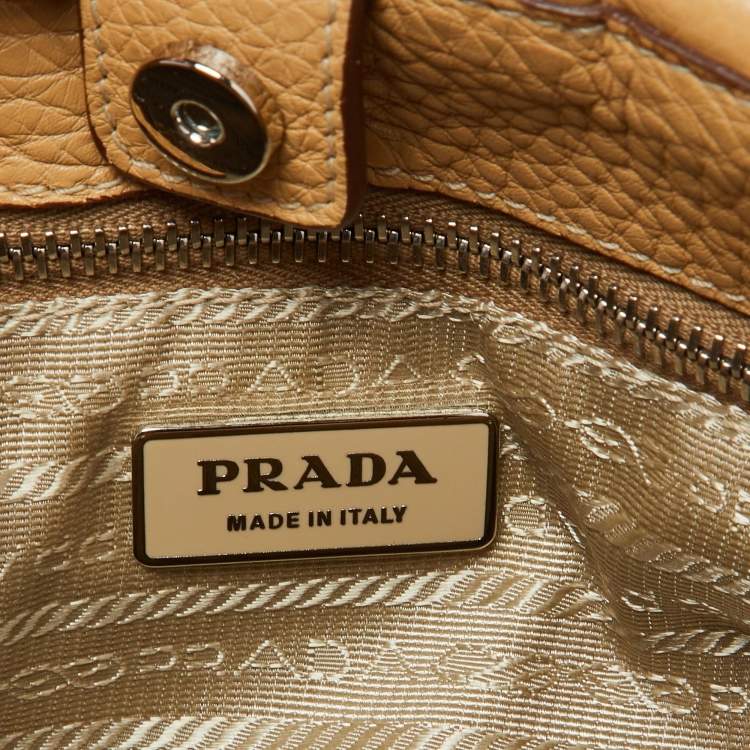 Pre Owned Prada Beige Vitello Daino Leather Pushlock Flap Hobo
