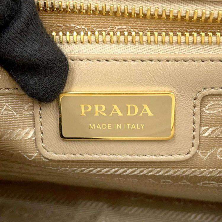 Pre Owned Prada Beige Saffiano Leather Re-Edition 1978 Medium Double Handle Bag