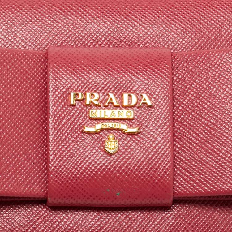 Pre Owned محفظة برادا كونتيننتال جلد سافيانو معدني وردي بقوس قلاب
