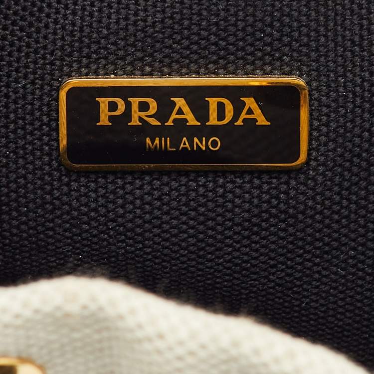 Pre Owned Prada Off White/Black Canvas and Leather Logo Drawstring Wristlet Pouch