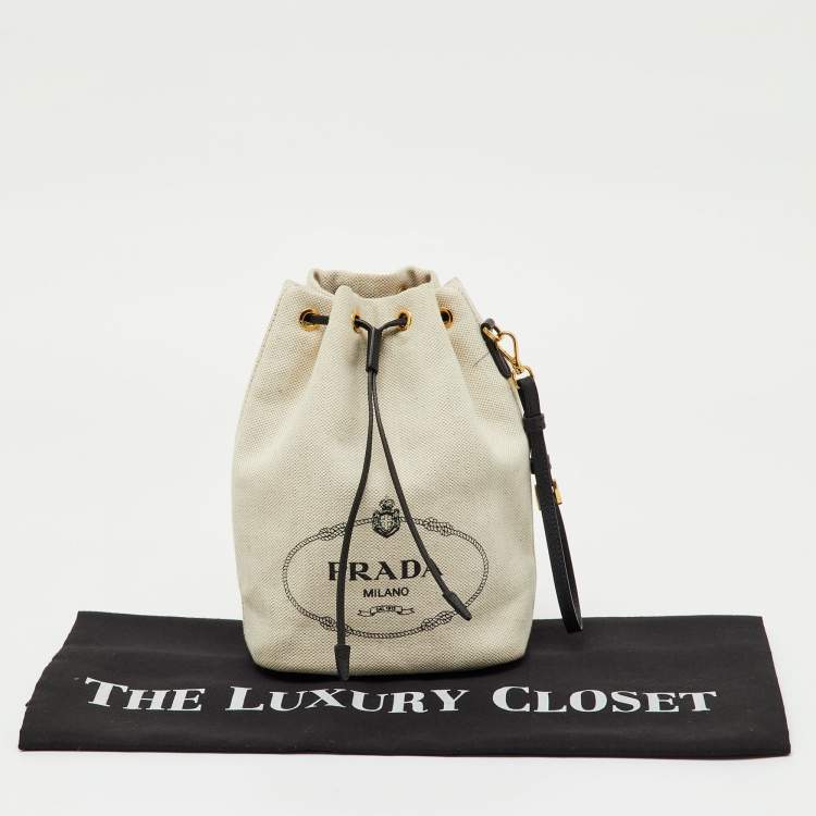 Pre Owned Prada Off White/Black Canvas and Leather Logo Drawstring Wristlet Pouch
