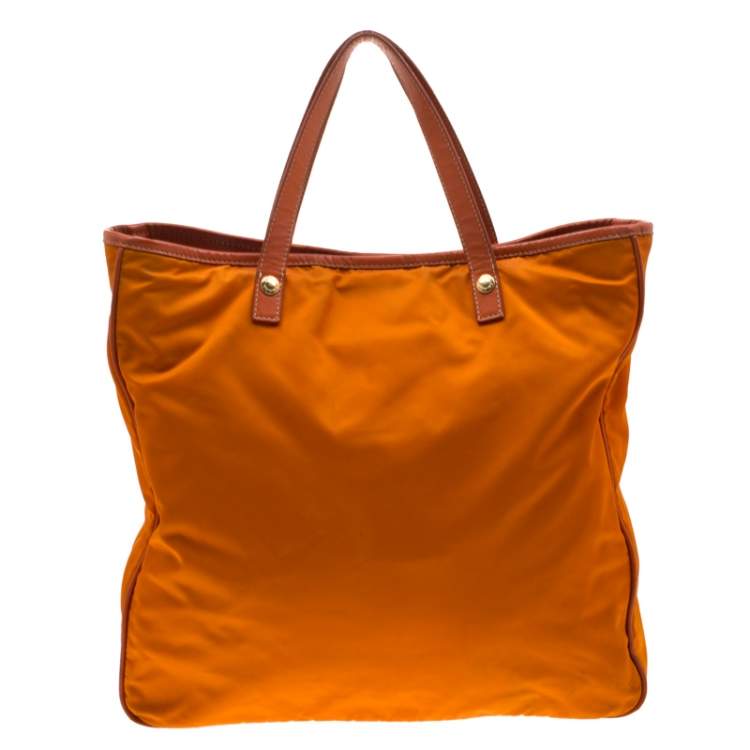 Pre Owned Prada Orange Nylon and Leather Lasercut Logo Tote 