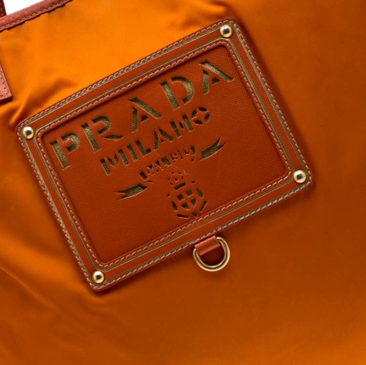Pre Owned Prada Orange Nylon and Leather Lasercut Logo Tote 