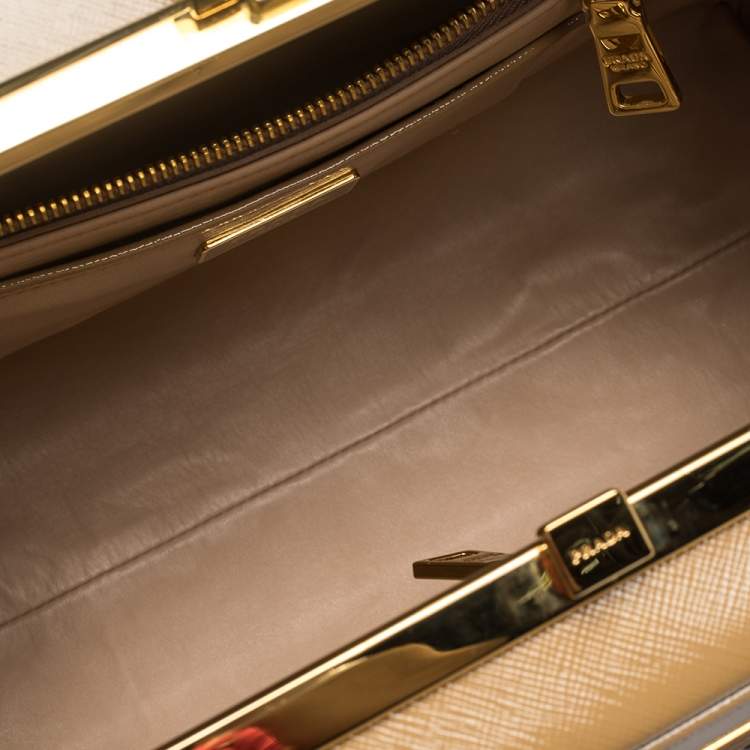 Pre Owned  Prada Beige Saffiano Venice Leather Pyramid Frame Top Handle Bag 