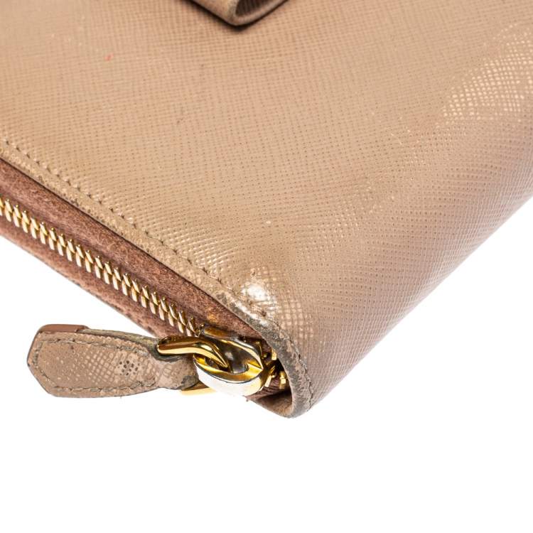 Pre Owned Prada Beige Saffiano Leather Bow Zip Around Wallet