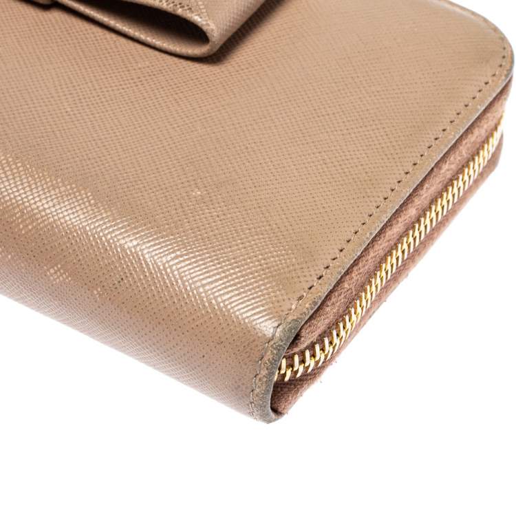 Pre Owned Prada Beige Saffiano Leather Bow Zip Around Wallet