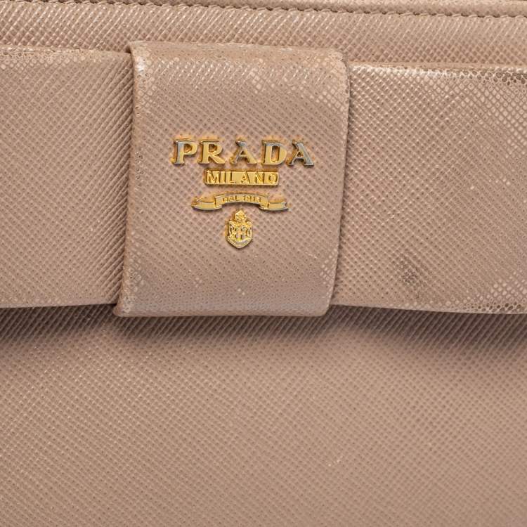 Pre Owned Prada Beige Saffiano Leather Bow Zip Around Wallet