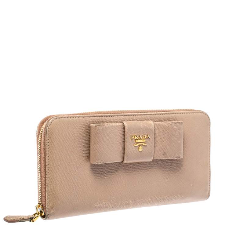 Pre Owned Prada Beige Saffiano Leather Bow Zip Around Wallet