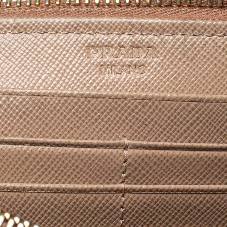 Pre Owned Prada Beige Saffiano Leather Bow Zip Around Wallet