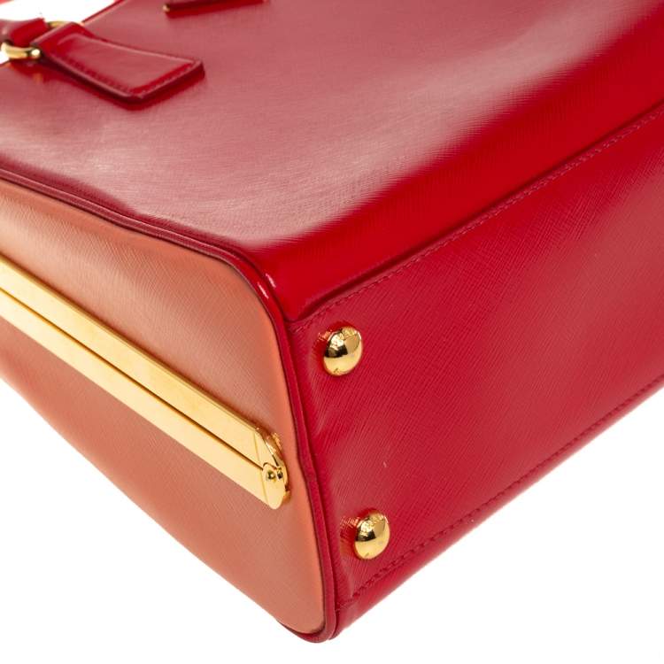 Pre Owned Prada Red/Orange Saffiano Parent Leather Pyramid Frame Top Handle Bag