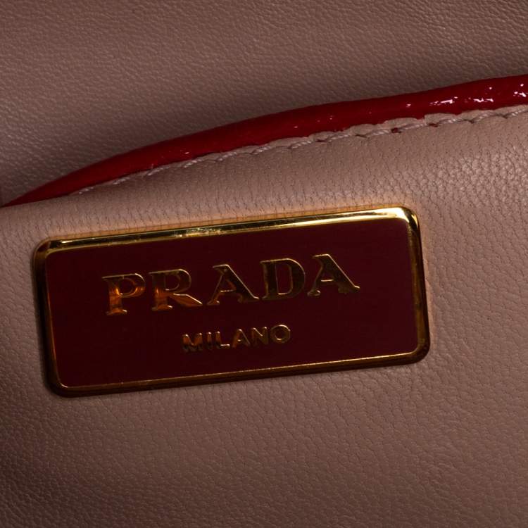 Pre Owned Prada Red/Orange Saffiano Parent Leather Pyramid Frame Top Handle Bag