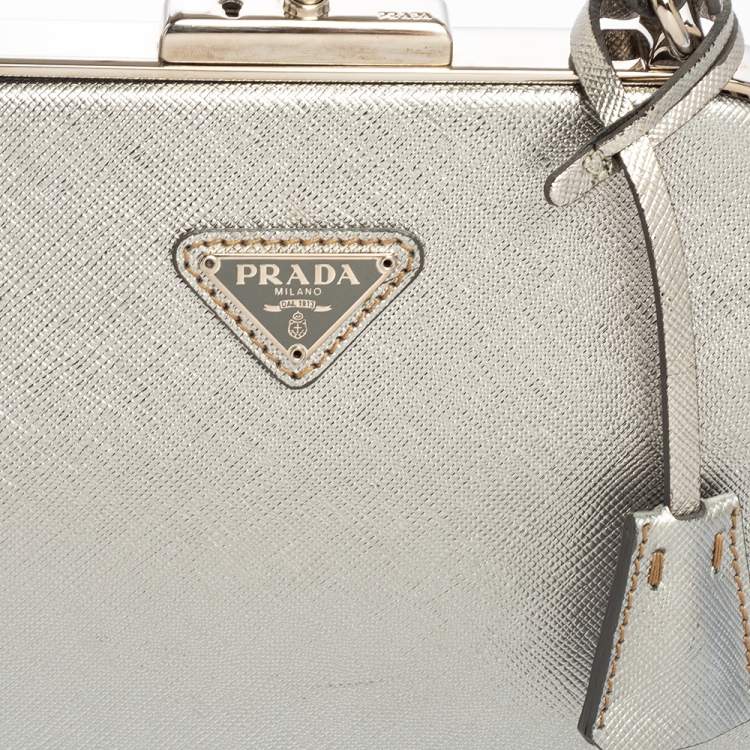 Pre Owned Prada Silver Saffiano Leather Frame Top Handle Bag