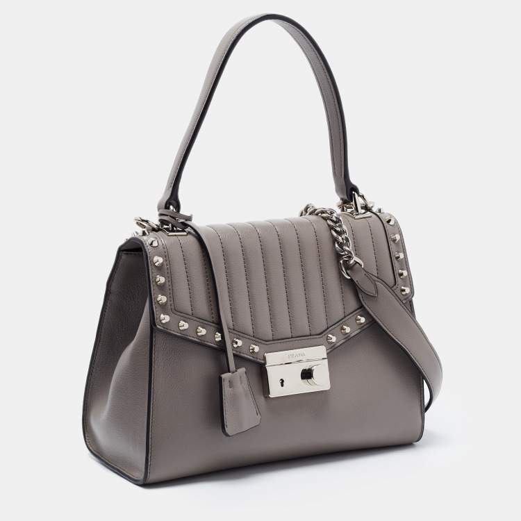 Pre Owned Prada Grey Studded Leather Sound Top Handle Bag