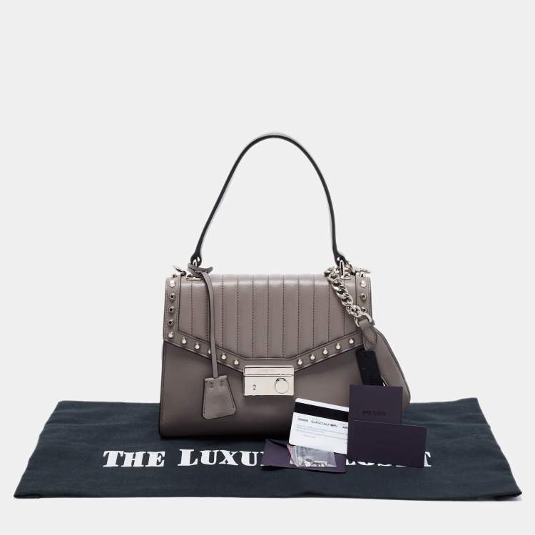 Pre Owned Prada Grey Studded Leather Sound Top Handle Bag