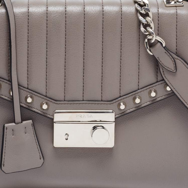 Pre Owned Prada Grey Studded Leather Sound Top Handle Bag