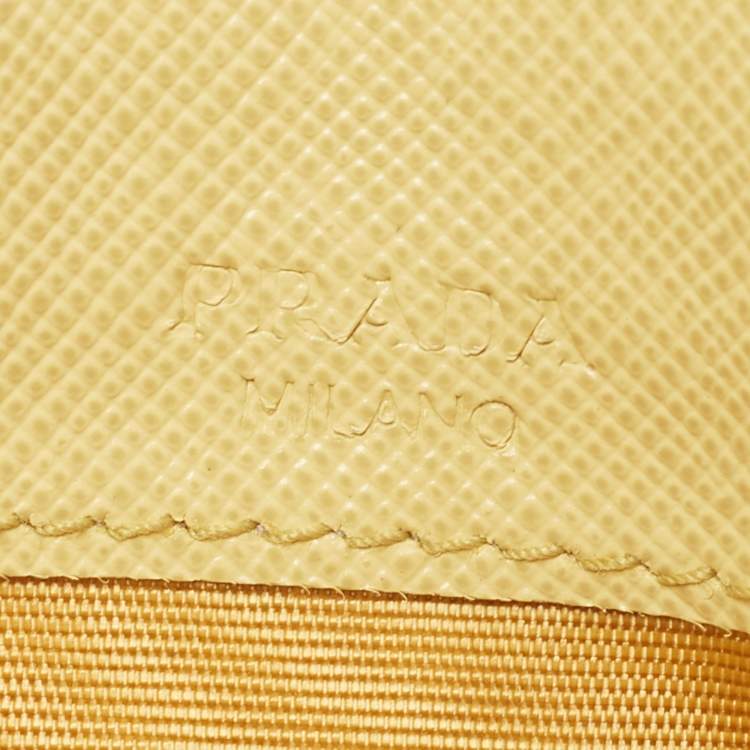 Pre Owned Prada Light Yellow Saffiano Metal Leather Card Holder