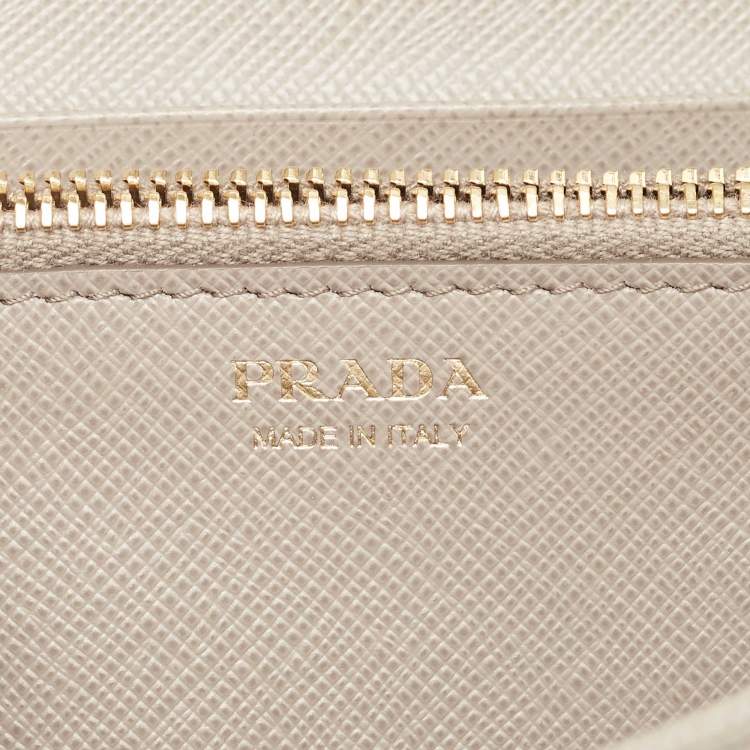 Pre Owned Prada Beige Saffiano Lux Leather Flap Continental Wallet