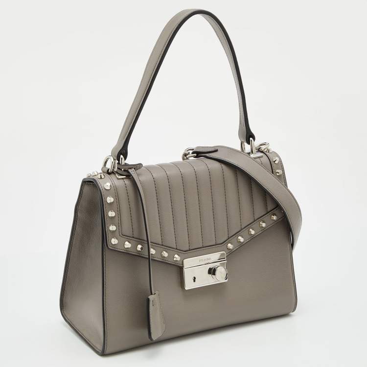 Pre Owned Prada Grey Glace Leather Studded Sound Top Handle Bag