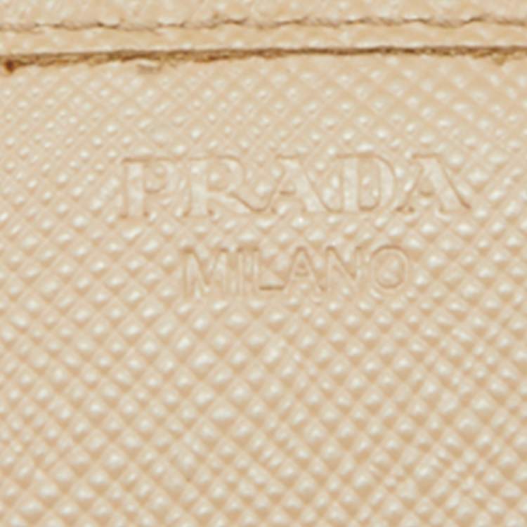 Pre Owned Prada Beige Saffiano Leather Flap Continental Wallet