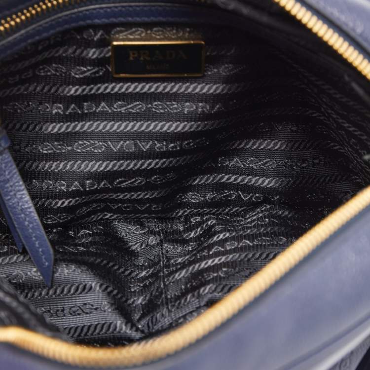 Pre Owned Prada Navy Blue Logo Embossed Leather Camera Crossbody Bag