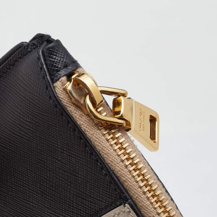 Pre Owned Prada White/Black Saffiano Leather Zip Clutch