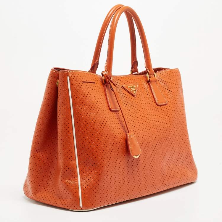 Pre Owned Prada White/Orange Perforated Saffiano Leather Large Gardener's Tote