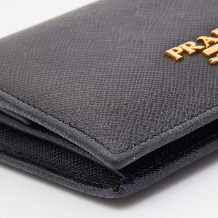 Pre Owned Prada Black Saffiano Metal Leather Logo Flap Card Case