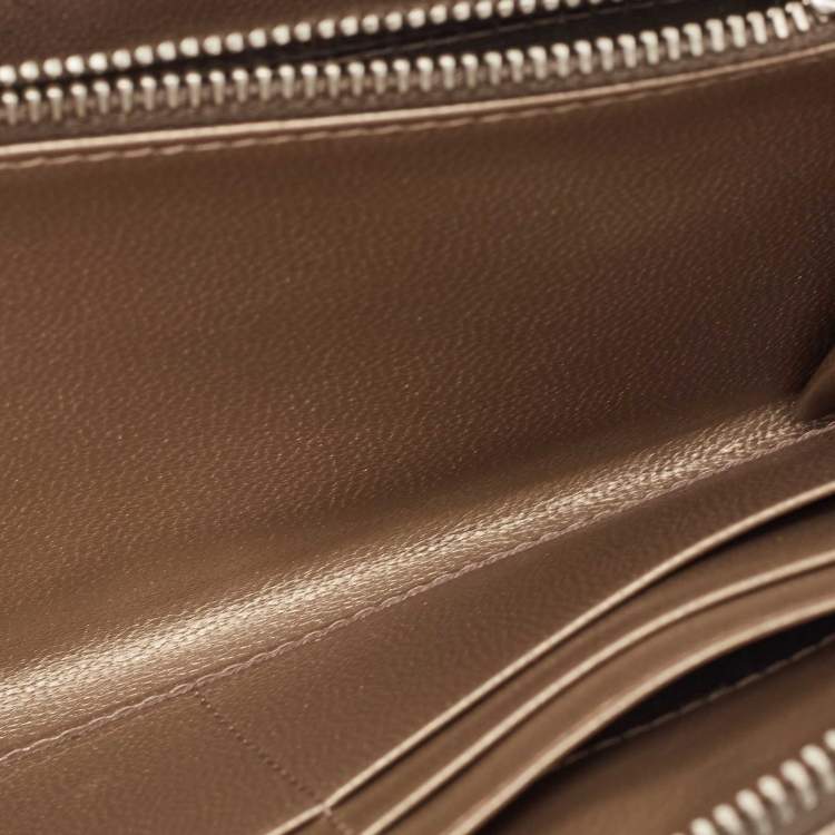 مملوكة مسبقًا Prada Gold/Silver Woven Madras Leather Zip Around Wallet
