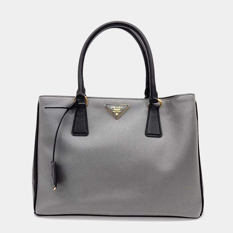 Used Prada Mini Re-Nylon Top Handle Bag in 90% condition.