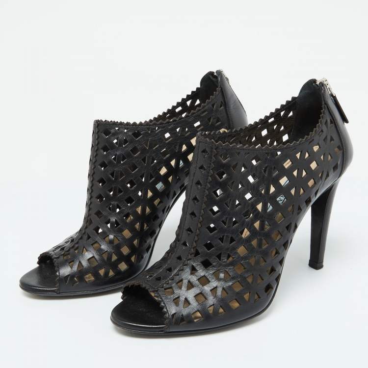 مملوكة مسبقًا Prada Black Perforated Leather Peep Toe Booties Size 38