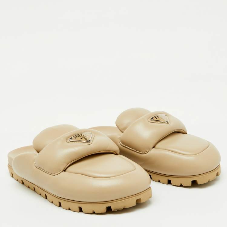 Pre Owned Prada Beige Leather Triangle Logo Soft Padded Mules Size 38.5