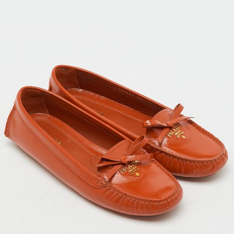 Pre Owned Prada Orange Patent Leather Bow Slip On Loafers Size 38.5
