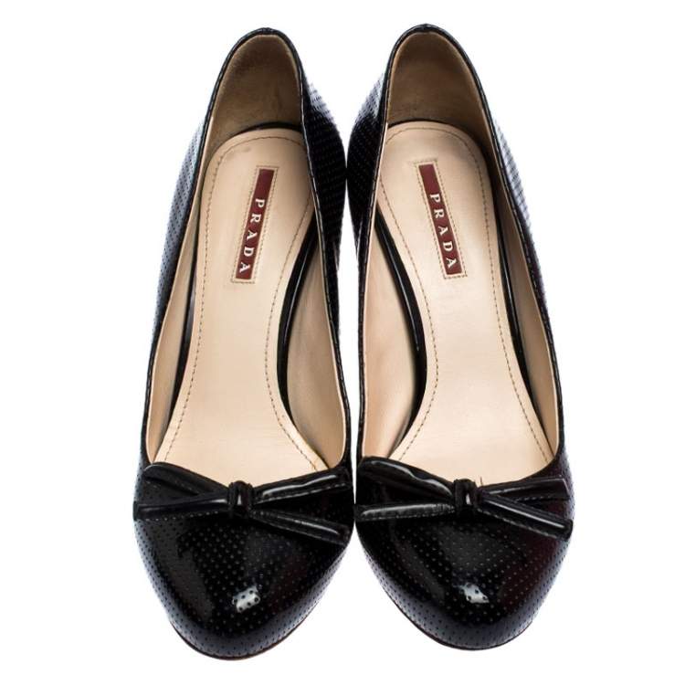 Prada Sport Black Perforated Leather Bow Wooden Heel Pumps Size 38