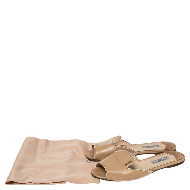 Pre Owned Prada Beige Patent Leather Logo Embellished Flat Slides Size 37.5